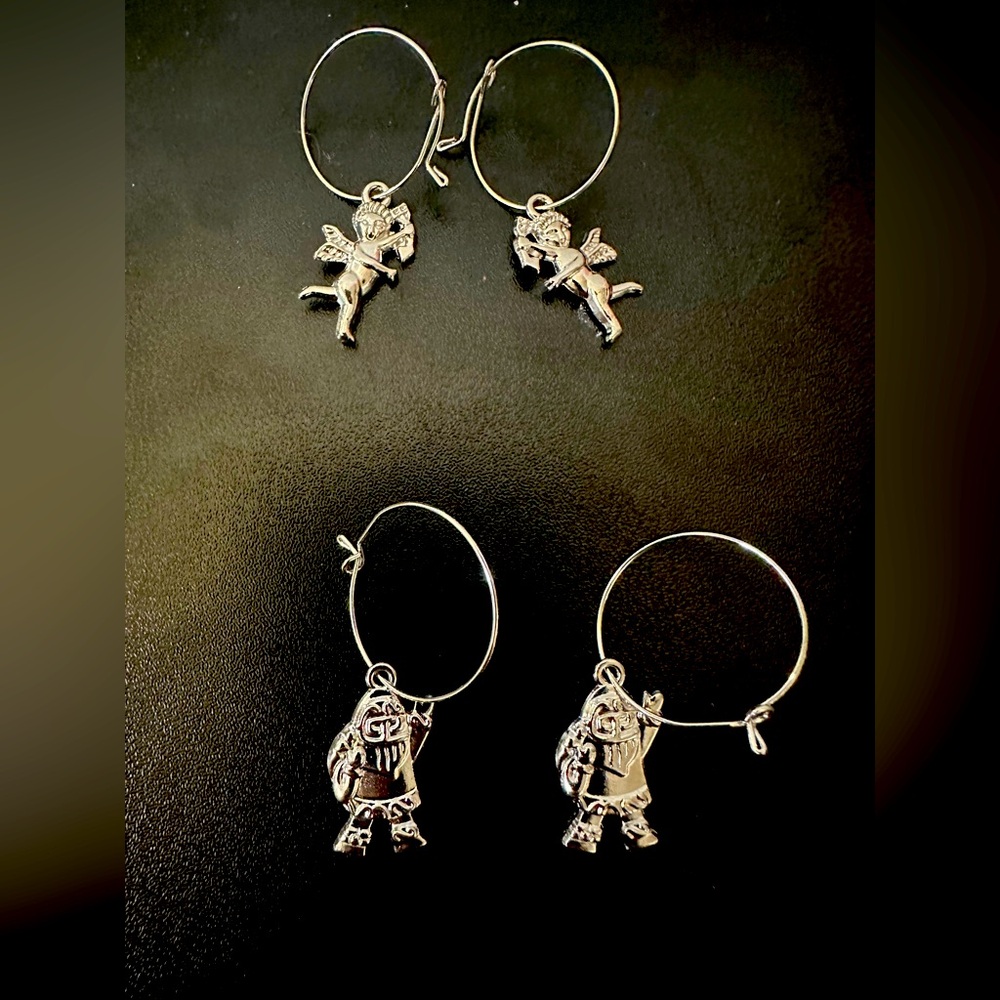 Brand New wine charms. Set of 4. Stainless steel.